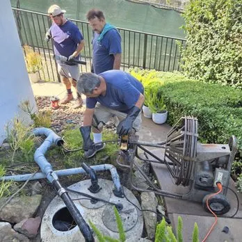 KCB Plumbing crew working on outdoor drain project