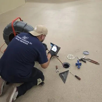 KCB Plumbing technician performing video pipe inspection