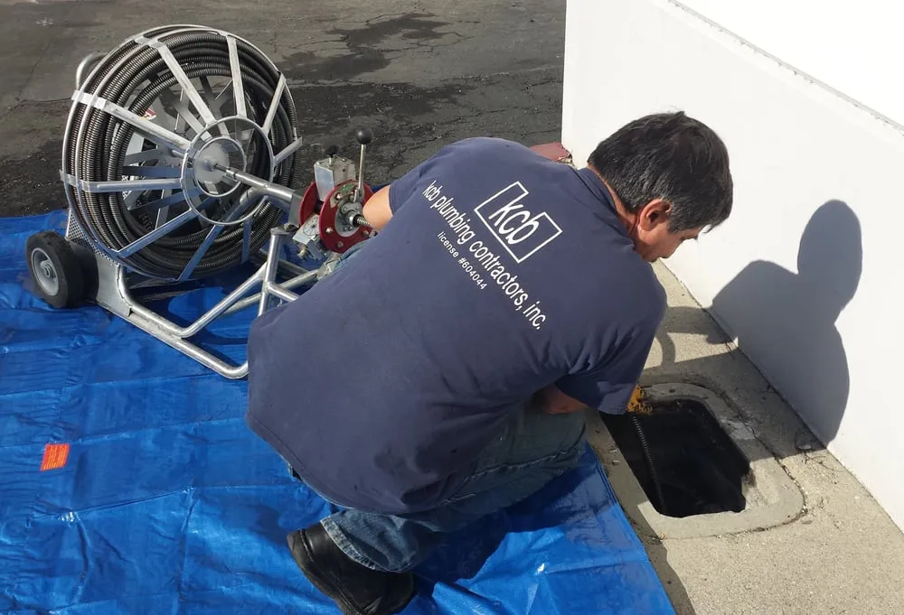 Licensed KCB Plumbing technician providing clog removal & drain snaking services in Orange County, CA