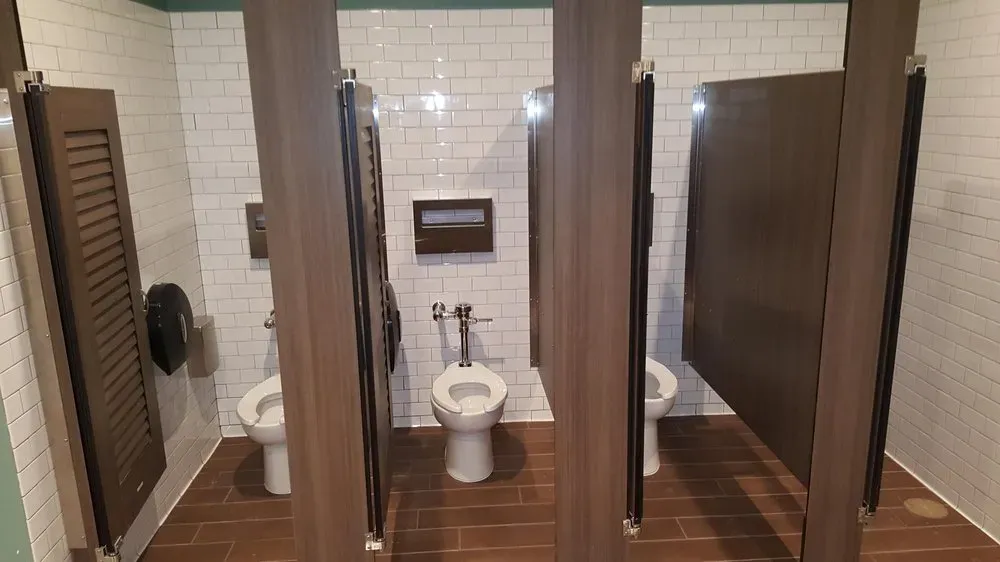 Commercial restroom plumbing from a KCB Plumbing amusement park project in Buena Park